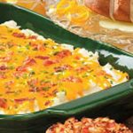 Originally published as "Everything" Mashed Potato Casserole in Reminisce October/November 2007
